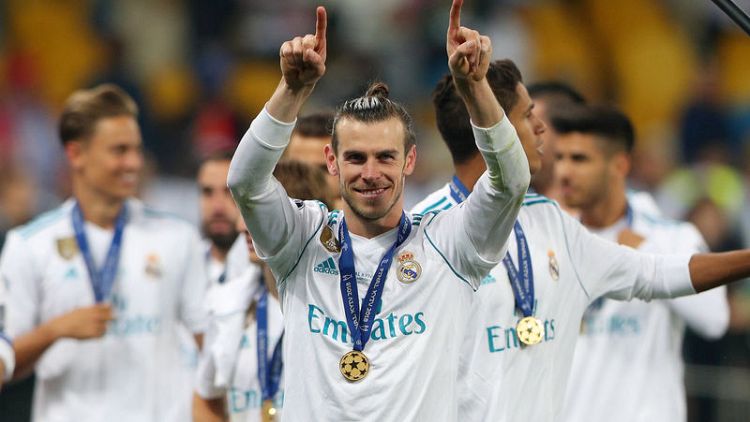 Super Bale sinks Liverpool as Madrid make it three in a row