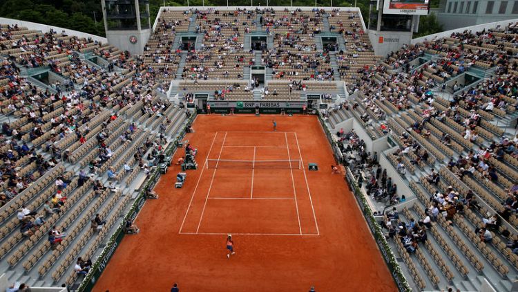 No need for 'Quiet Please' at French Open - stands half empty