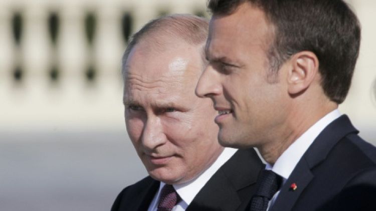 Poutine et Macron devant les milieux d'affaires russes après avoir renoué le dialogue