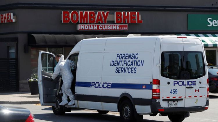 Canada police seek suspects in restaurant bombing, 15 injured