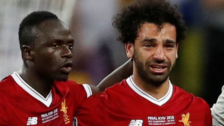 Teary Salah goes off injured in Champions League final