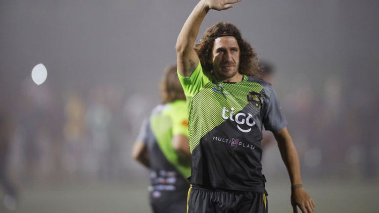 Furious Puyol wants Barca priority shift after more Madrid glory