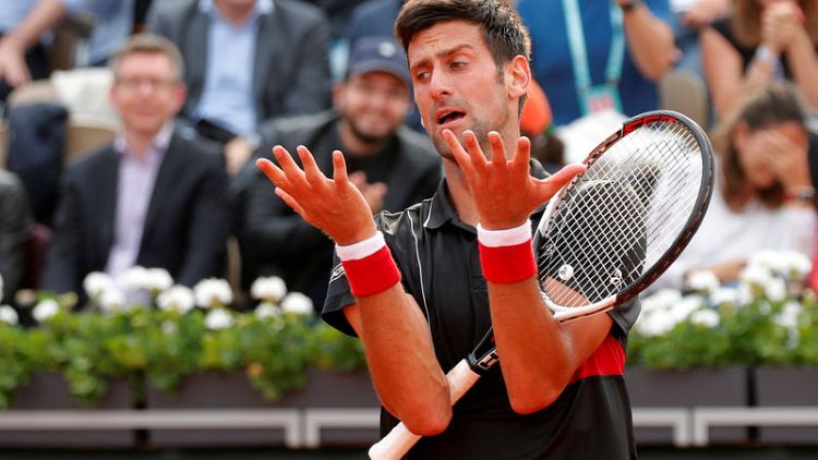 Beaten Djokovic says may he skip Wimbledon