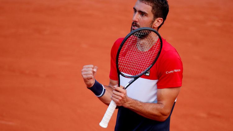 Cilic stands firm to withstand Fognini fightback
