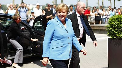 Merkel says political hate speech is 'playing with fire' Merkel says political hate speech is 'playing with fire'