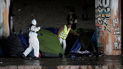 Police clear out two more migrant camps in Paris Police clear out two more migrant camps in Paris