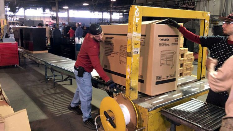 U.S. factories shift into 'higher gear' despite trade worries - Fed