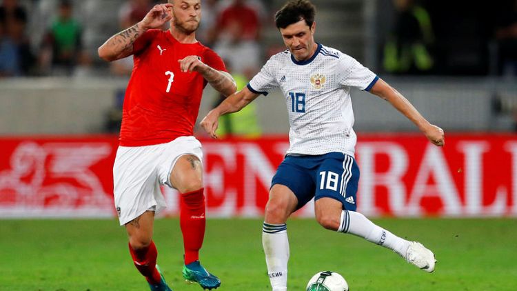 World Cup hosts Russia suffer more misery in loss to Austria