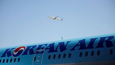Prosecutors raid Korean Air over suspected embezzlement by founding family Prosecutors raid Korean Air over suspected embezzlement by founding family