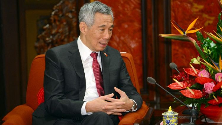 رئيس وزراء سنغافورة يلتقي بشكل منفصل مع الزعيمين الكوري الشمالي والأمريكي