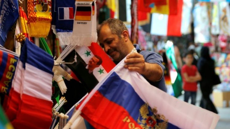 Mondial-2018: à Damas, le drapeau russe rivalise avec ceux des favoris