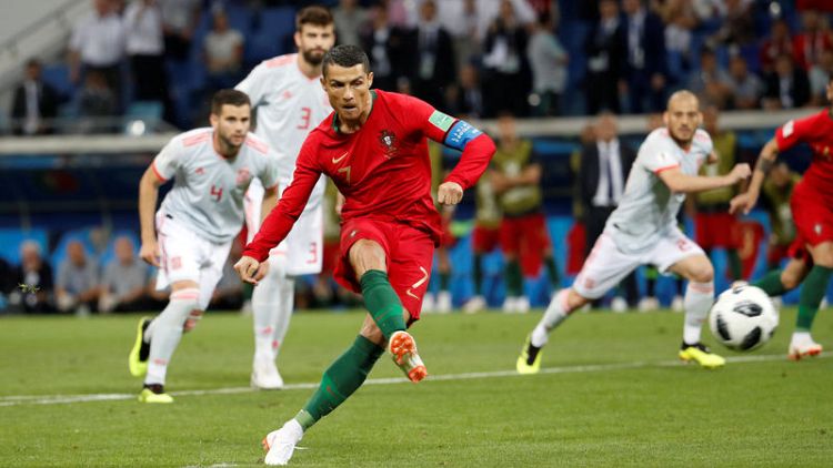 Hat-trick hero Ronaldo denies Spain in six-goal thriller