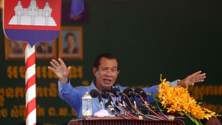 Crackdown and cash - Hun Sen's recipe for victory in Cambodian poll