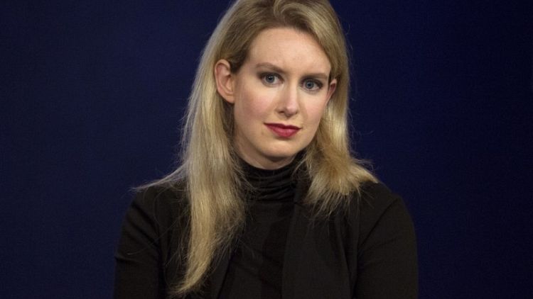 Theranos founder Holmes, former president indicted for fraud