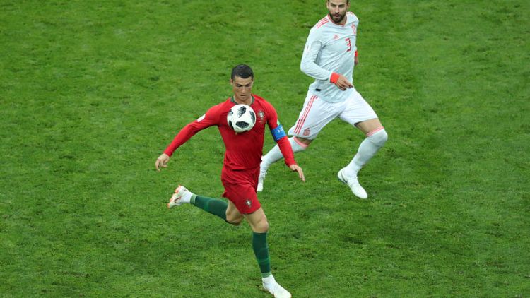 Pique says Ronaldo 'prone to diving' after thrilling draw