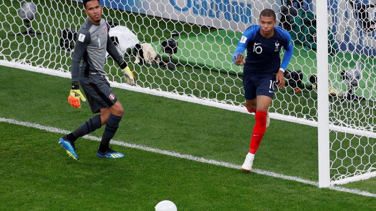 Mbappe puts France in last 16 as feisty Peru go out