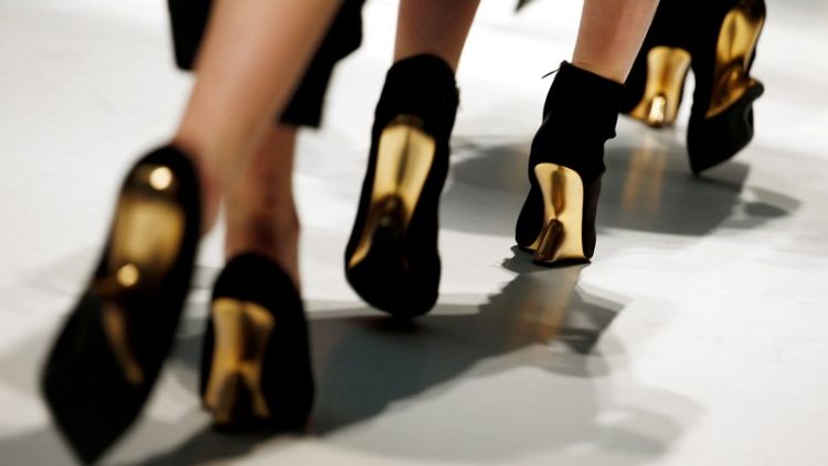 Italy's Ferragamo shares tumble after family trims stake