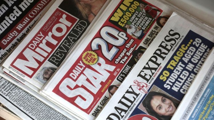 UK clears Daily Mirror publisher's takeover of Express titles