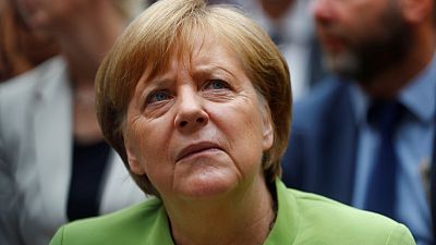 Threatened by coalition partner, Merkel seeks to break migration deadlock