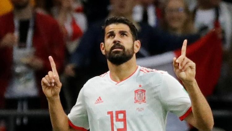 كوستا المحظوظ يسجل في فوز صعب لإسبانيا على إيران