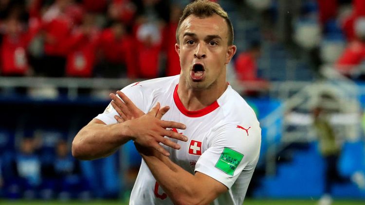 Swiss players escape bans over goal celebrations