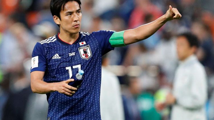Japan focus on winning not drawing, says captain Hasebe