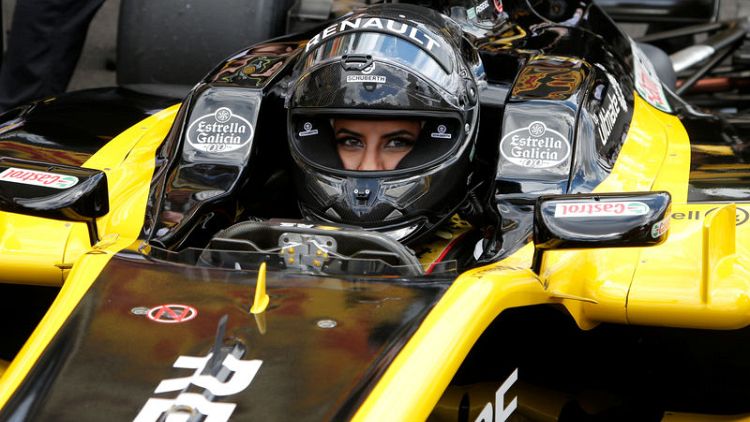 Saudi woman drives F1 car on historic day