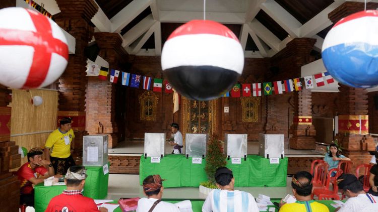 Indonesia on high alert as voting starts in regional elections