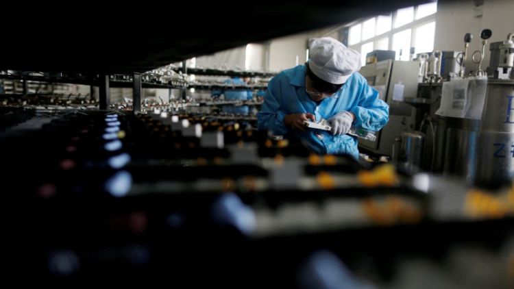 China factory growth seen cooling slightly in June, trade war a worry