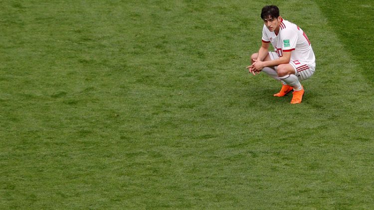 Iran striker Azmoun quits national team citing insults