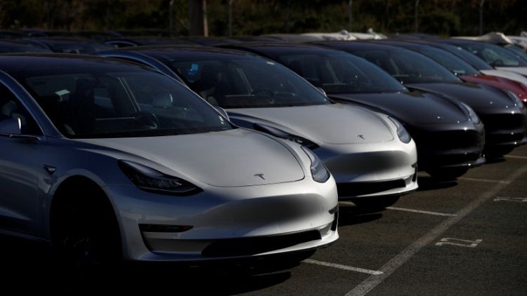 Tesla's all-nighter to hit production goal fails to convince Wall Street