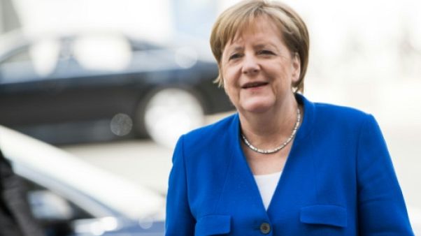 Critiques en Europe après l'accord en Allemagne sur les migrants Critiques en Europe après l'accord en Allemagne sur les migrants