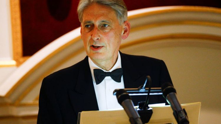 Hammond says 'urgent' progress needed on Brexit stance