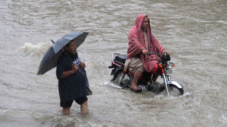 Record rains turn Pakistani city's roads into rivers; six dead