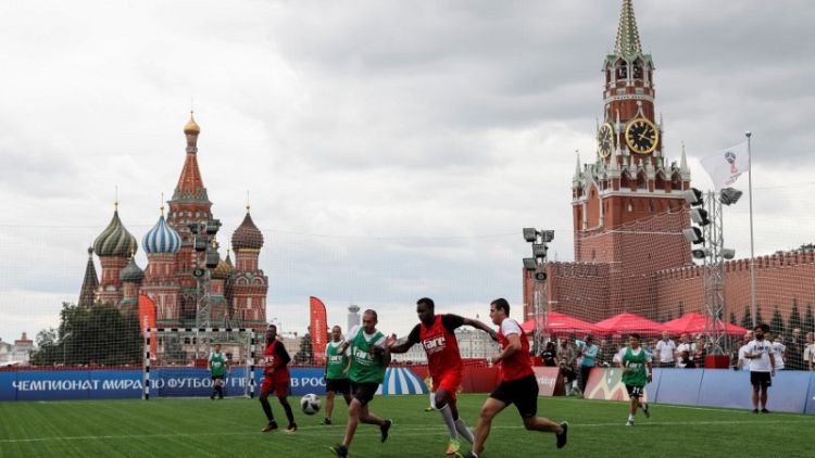 Asian, African migrants living in Russia play soccer on Red Square