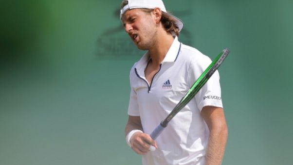 Wimbledon: le N.1 français Pouille éliminé au 2e tour par le 171e mondial Wimbledon: le N.1 français Pouille éliminé au 2e tour par le 171e mondial