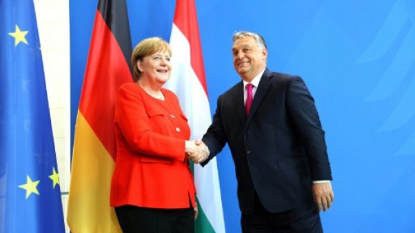 Migrants: Merkel et Orban s'opposent sur les "valeurs" de l'Europe Migrants: Merkel et Orban s'opposent sur les "valeurs" de l'Europe