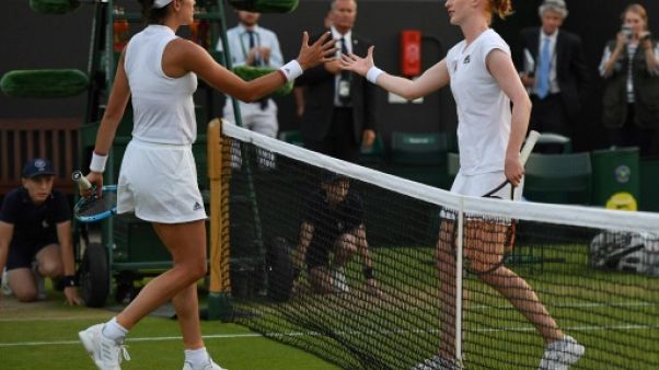 Wimbledon: la tenante du titre Muguruza éliminée dès le deuxième tour Wimbledon: la tenante du titre Muguruza éliminée dès le deuxième tour