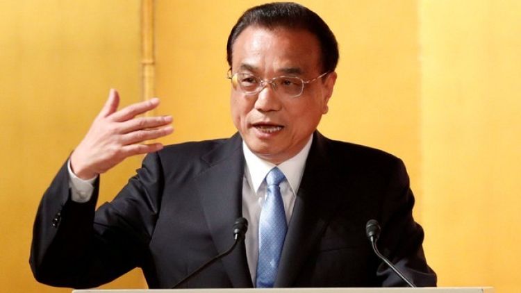 Open your firms to Chinese investment, Li tells Germany