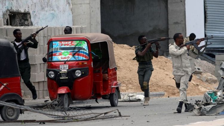 Al Shabaab fighters attack Somalia police HQ after twin bombings