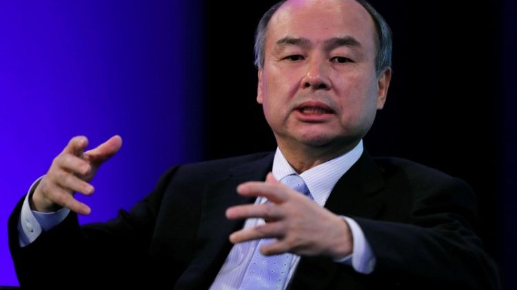 SoftBank's Son says to carry on with deals despite trade jitters