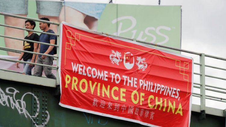 'Philippines, Province of China' signs stir anger on anniversary of arbitration win