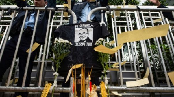 A Hong Kong, des militants commémorent la mort du dissident Liu Xiaobo A Hong Kong, des militants commémorent la mort du dissident Liu Xiaobo