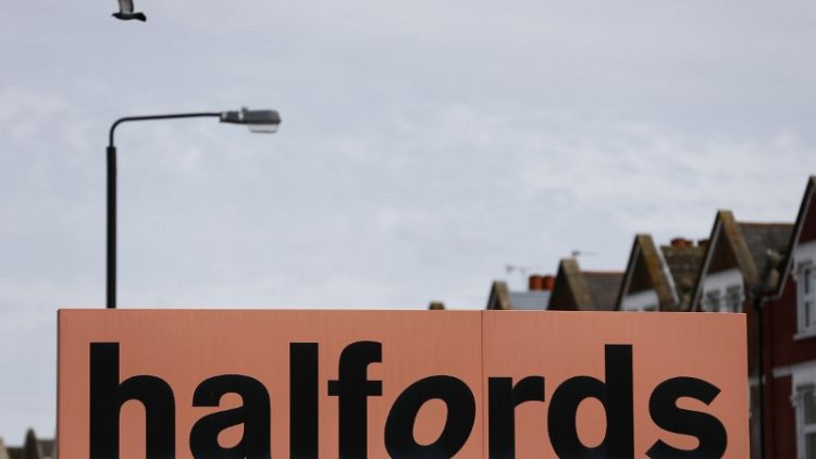 Halfords names Waitrose's Woodhouse as finance chief