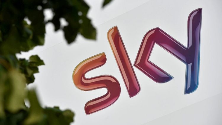 UK Takeover Panel says Disney would need to bid at least 14 pounds/share for Sky
