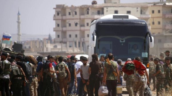 Syrie: début de l'évacuation des rebelles de Deraa, ex-bastion de la révolte Syrie: début de l'évacuation des rebelles de Deraa, ex-bastion de la révolte