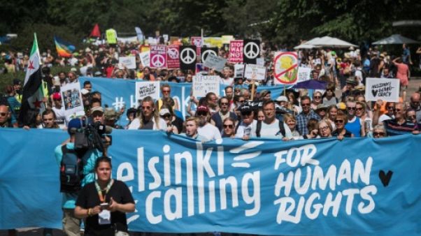 Des milliers de personnes manifestent à Helsinki avant le sommet Trump-Poutine Des milliers de personnes manifestent à Helsinki avant le sommet Trump-Poutine
