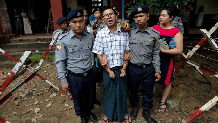 Myanmar police focussed interrogation on Rohingya story - Reuters journalist