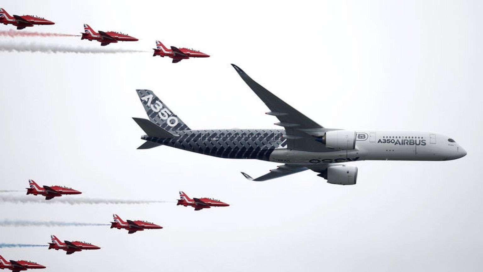Jetmakers see brisk start to air show as UK tries to soothe Brexit worries
