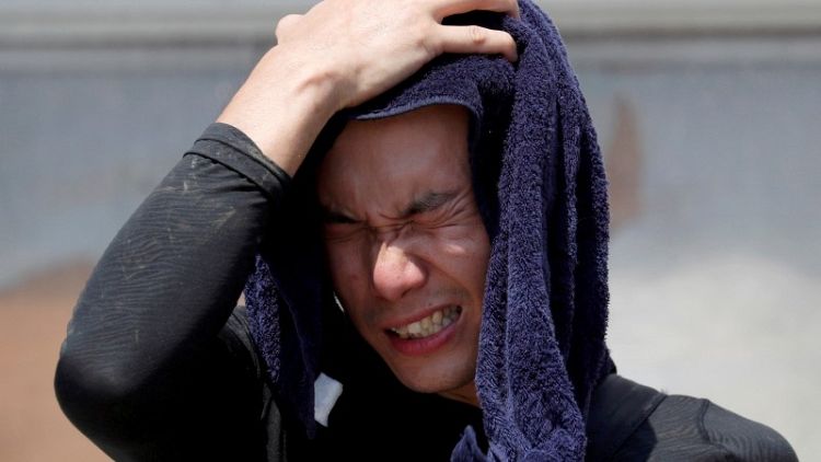 Heatwave blankets Japan, kills 14 people over long weekend
